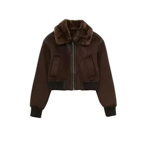 Vintage dark brown reversible jacket for women featuring a faux fur collar and ribbed cuffs