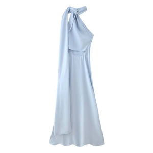 Detail of light blue satin halter dress featuring an open back and elegant long ribbons