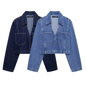 Flat lay of cropped denim jackets in dark and light blue with front flap pockets