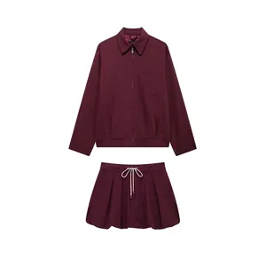 Women's burgundy long sleeve zipper jacket and matching drawstring mini skirt set
