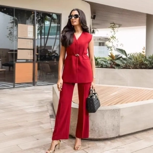Women's chic red sleeveless V-neck vest and wide-leg pants set with a slim belt