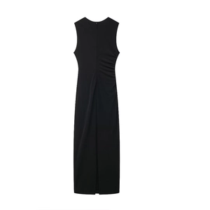 Detail view of black midi dress featuring invisible back zipper and side ruching details
