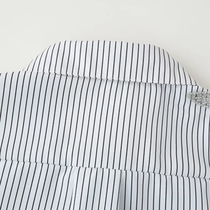 Vertical striped white shirt for women featuring elegant beaded shoulder embroidery detail