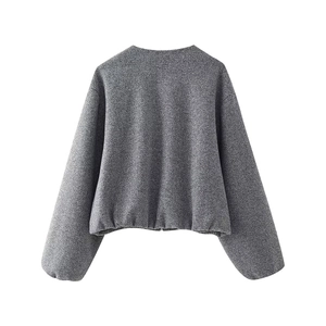 Women's casual gray knit jacket featuring oversized sleeves and a relaxed silhouette