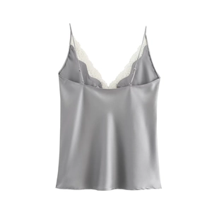 Detail of grey satin camisole top with delicate white lace trim and adjustable straps