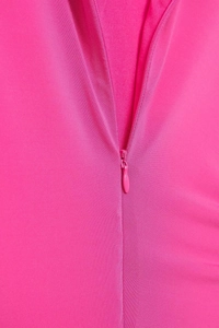 Detailed macro view of the invisible teardrop zipper on the bright pink midi dress