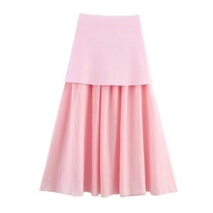 Detail of pink patchwork maxi skirt with pleated chiffon hem and high-waisted A-line cut
