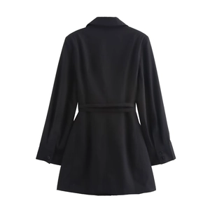 Women's elegant black long sleeve blazer dress with waist belt and button cuffs on white background