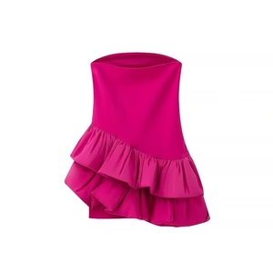 Detail of fuchsia asymmetrical tiered ruffles on a sleeveless fashion dress