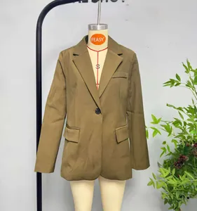 Detail of single-button earth-tone casual blazer with notched lapels and flap pockets