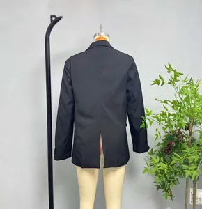 Back view of black tailored blazer featuring a center seam and a single back vent detail