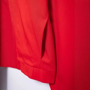 Red zip-up lapel jacket with side pockets and smooth woven finish for women