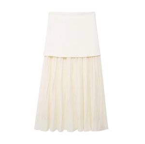 Sleeveless ivory knit dress with textured ribbing and pleated tulle skirt detail