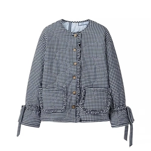 Veste matelassée réversible à carreaux noir et blanc avec volants et nœuds aux manches