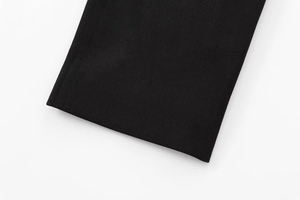 Macro view of black diagonal twill fabric texture for casual street style blazer