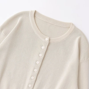 Women's chic beige crew neck knitted cardigan with button-down front for casual wear