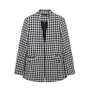 Women's French style houndstooth wool blazer with elegant gold-rimmed buttons and flat pockets