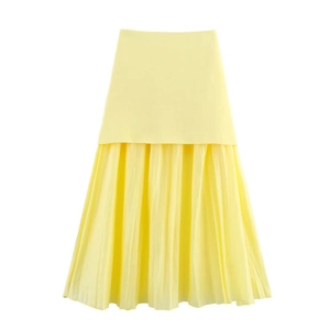 Elegant light yellow knit and pleated midi skirt featuring a unique patchwork design