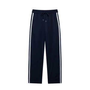 Navy blue casual track pants with white side stripes and elastic drawstring waist