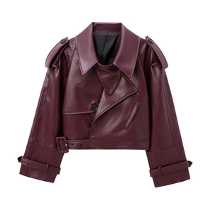 Detailed view of dark burgundy biker jacket with shoulder epaulets and belt buckle accents