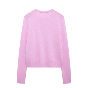 Women's light pink long sleeve knit cardigan with ribbed cuffs and hem, back view display