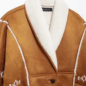 Brown suede and shearling coat with embroidery details for women in street fashion style