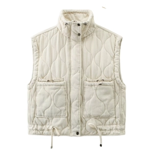 Detail of cream quilted vest featuring a stand collar, wave stitching and adjustable cords