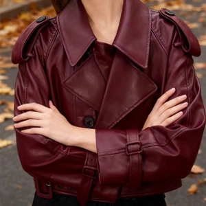 Chic dark burgundy faux leather moto jacket with oversized shoulders and trench details