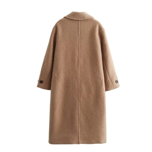 Detail view of the camel wool coat back showing high-quality textured fabric and stitching