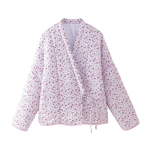 Pink floral quilted jacket with tie-waist detail and vintage street style for women