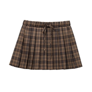 Brown plaid pleated mini skirt with elastic waist and decorative bow accent