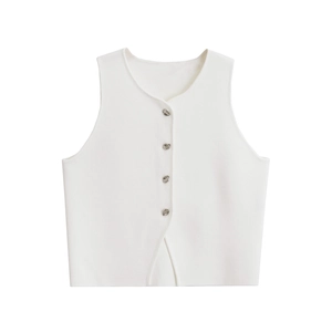 Close-up of white knitted vest featuring silver metallic buttons and delicate hem slit detail
