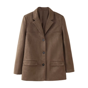Detail of brown suede-like blazer featuring notched lapels and triple button closure