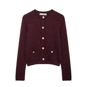 Classic burgundy knit cardigan with gold buttons and pockets in a minimalist style
