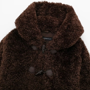 Dark brown faux fur coat for women with classic horn button closure and large lapels