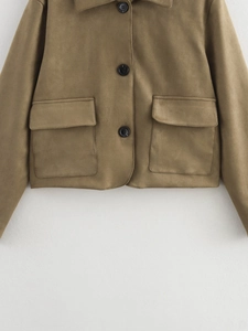 Detail of lapel collar and large flap pockets on a short suede-style jacket in khaki