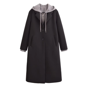 Detail of black coat with integrated grey detachable hoodie and silver metal zipper