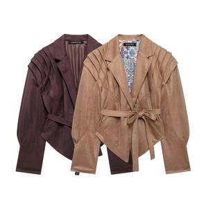 Detail of pleated shoulders and drawstring waist on faux suede jackets in purple and brown