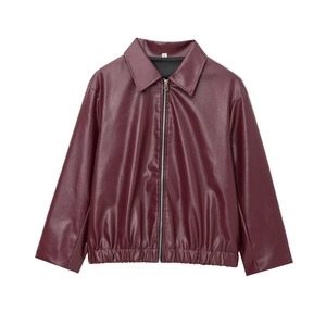 Detail of burgundy PU leather jacket showing lapel collar and elasticated waist hem