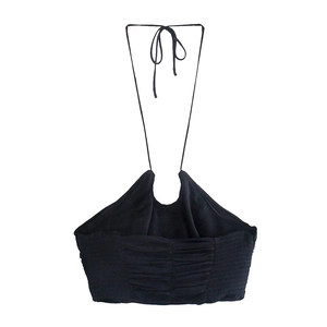 Detailed back view of black halter neck top featuring elastic smocking and tie-neck design