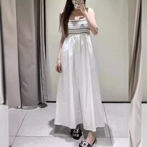 Women's white strapless maxi dress with black geometric embroidery and smocked waist