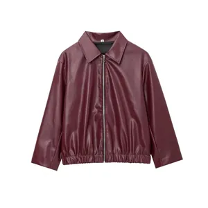 Short burgundy faux leather jacket with zip closure and elastic hem on white background