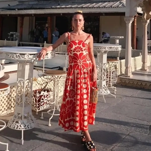 Red and off-white floral print maxi dress with thin straps for summer outdoor wear