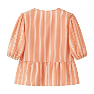 Detailed back view of striped short sleeve shirt with puff sleeves and ruffled hem