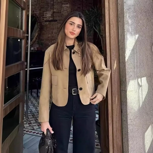 Classic khaki suede jacket for women featuring contrast buttons and large square pockets