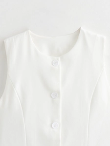 Detail of white sleeveless vest featuring round neck and matching white buttons texture