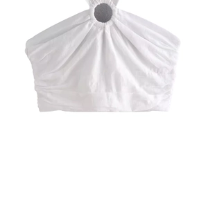 White halter top with ring buckle and pleated texture in a cropped minimalist style