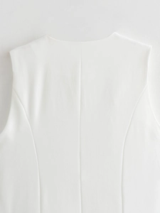 Detail of white sleeveless vest showing premium stitching and slim fit princess seams