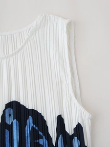 Detail of pleated sleeveless dress with blue abstract geometric print and round neck