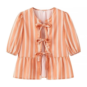 Vertical orange striped blouse with bow ties, lantern sleeves and ruffled hem details